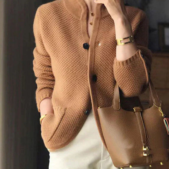 Women's textured knit button-front cardigan with long sleeves and patch pockets