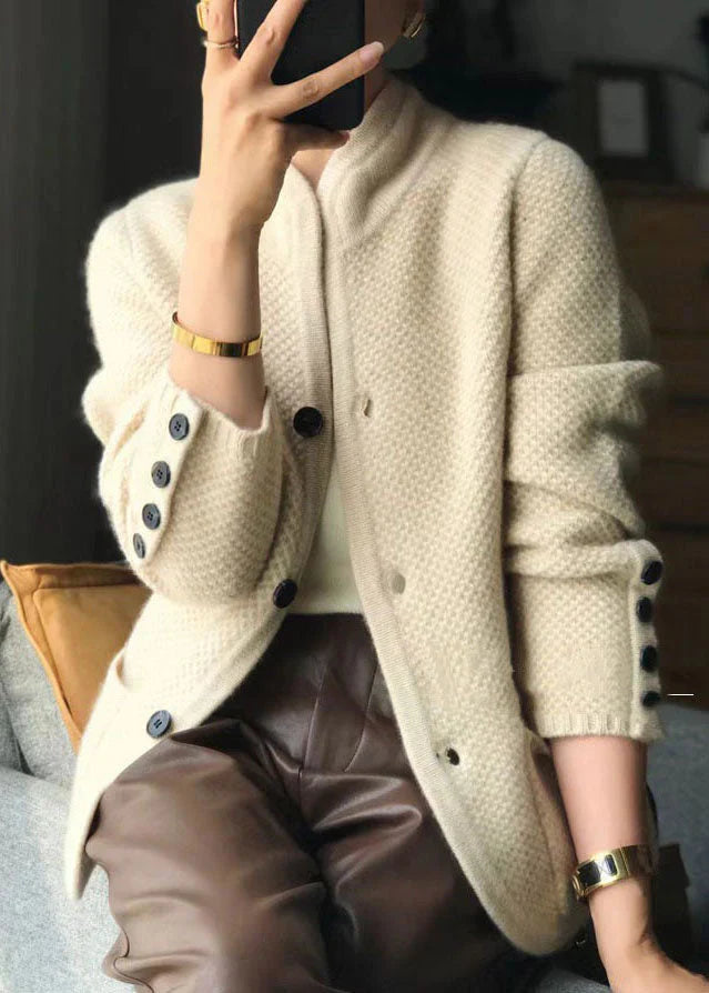 Women's textured knit button-front cardigan with long sleeves and patch pockets