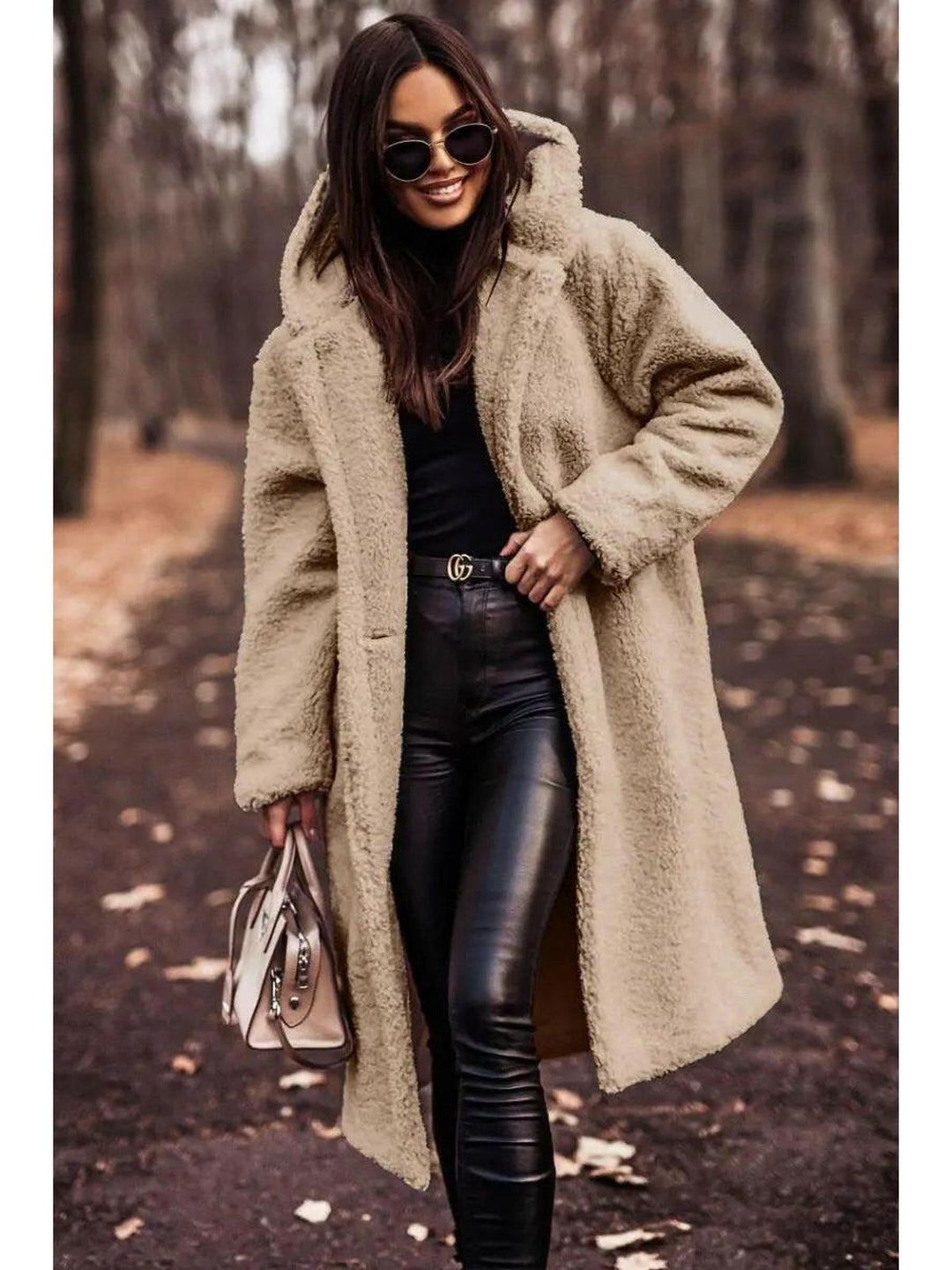 Women's longline hooded teddy coat with long sleeves and front pockets