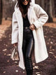 Women's longline hooded teddy coat with long sleeves and front pockets