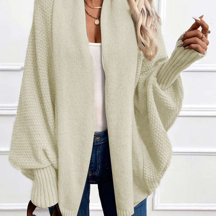 Women's draped open-front cardigan with shawl collar and ribbed cuffs