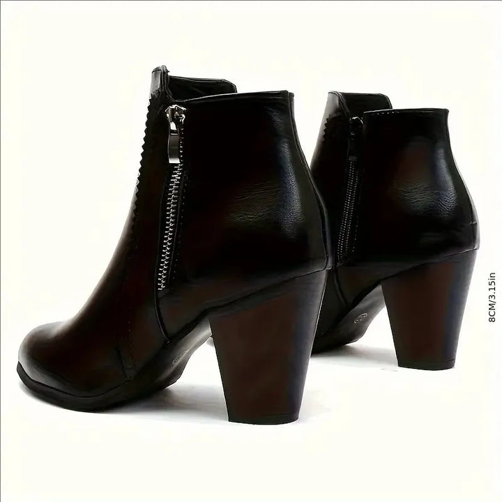 Women's ankle boots with side zippers and high block heels in black and brown