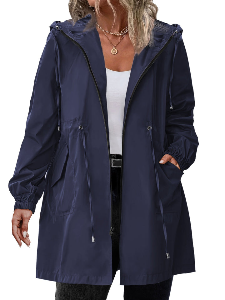 Women's longline hooded raincoat with drawstring waist