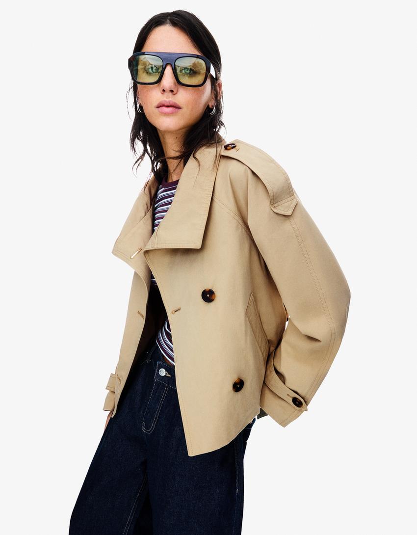 Women's trench jacket with high collar, button front, tie belt and long sleeves