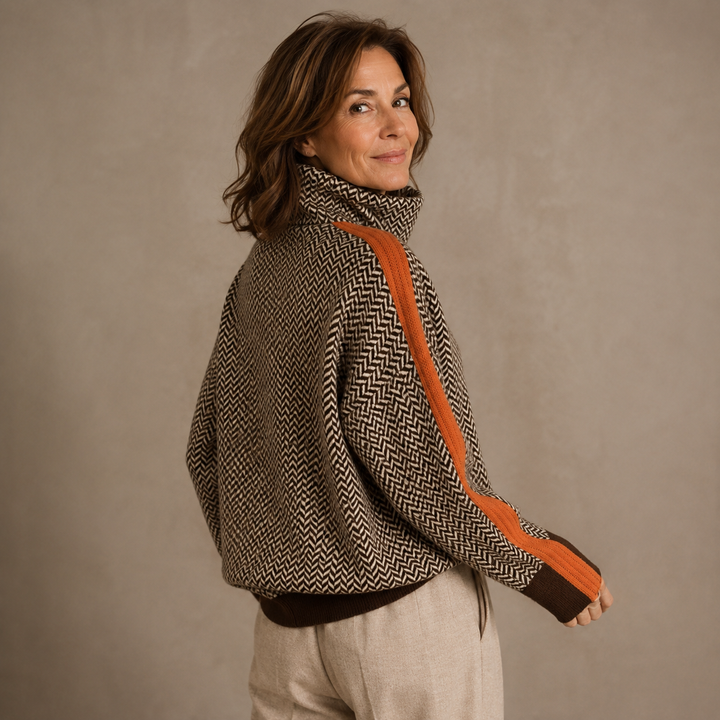 Women's herringbone turtleneck sweater with long sleeves and contrast trim