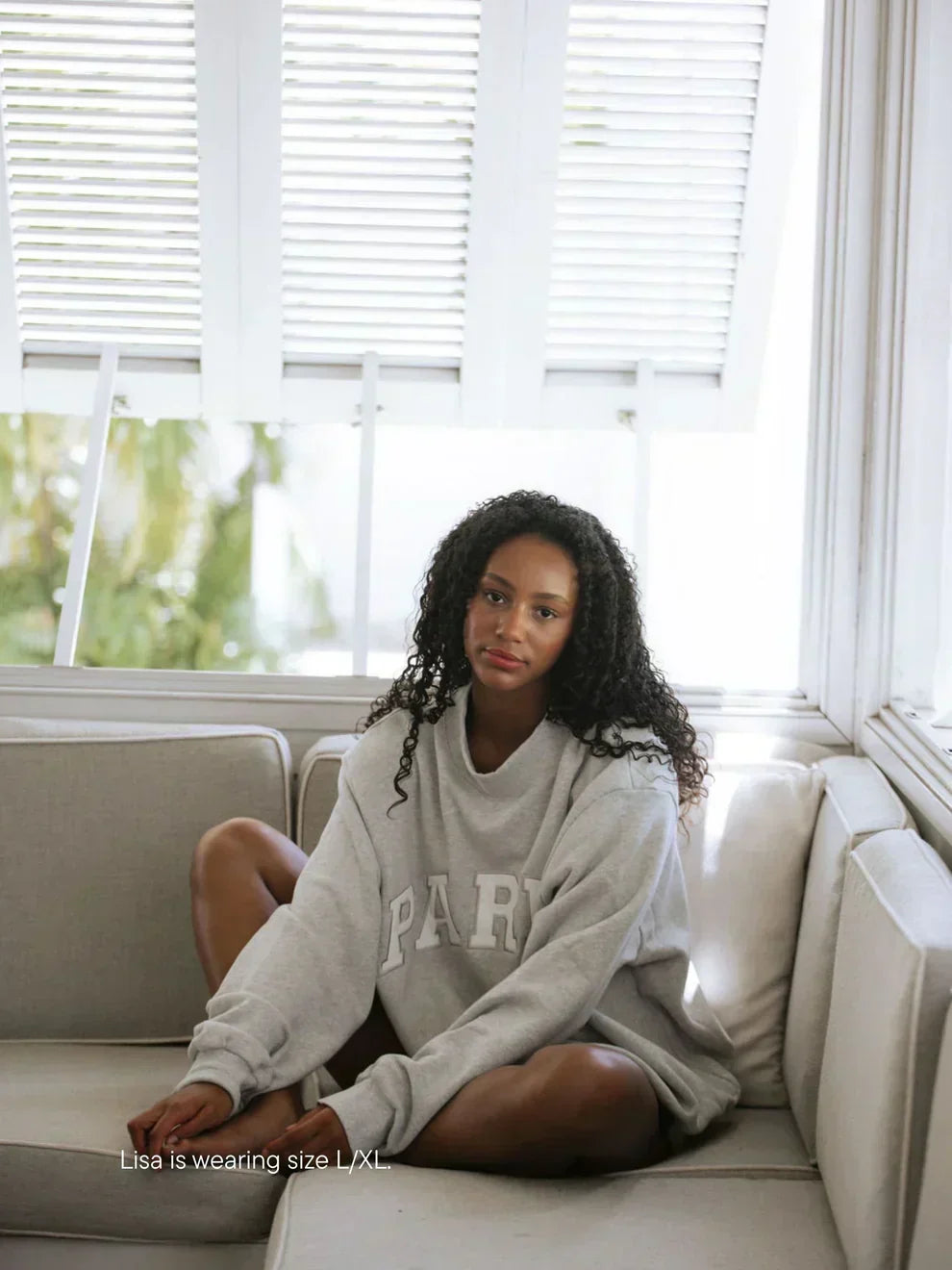 Women's grey oversized sweatshirt with white PARK lettering