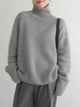 Women's relaxed turtleneck sweater with long sleeves and ribbed trims