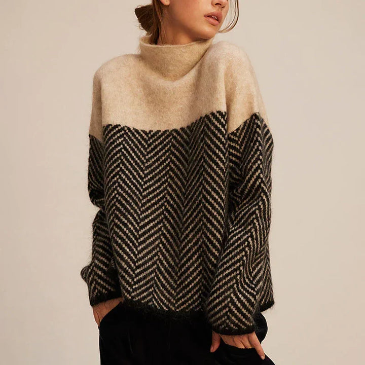Women's funnel neck sweater with contrasting chevron pattern