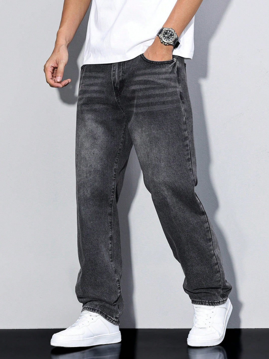 Men's straight fit full-length jeans with a mid-rise waist and front pockets