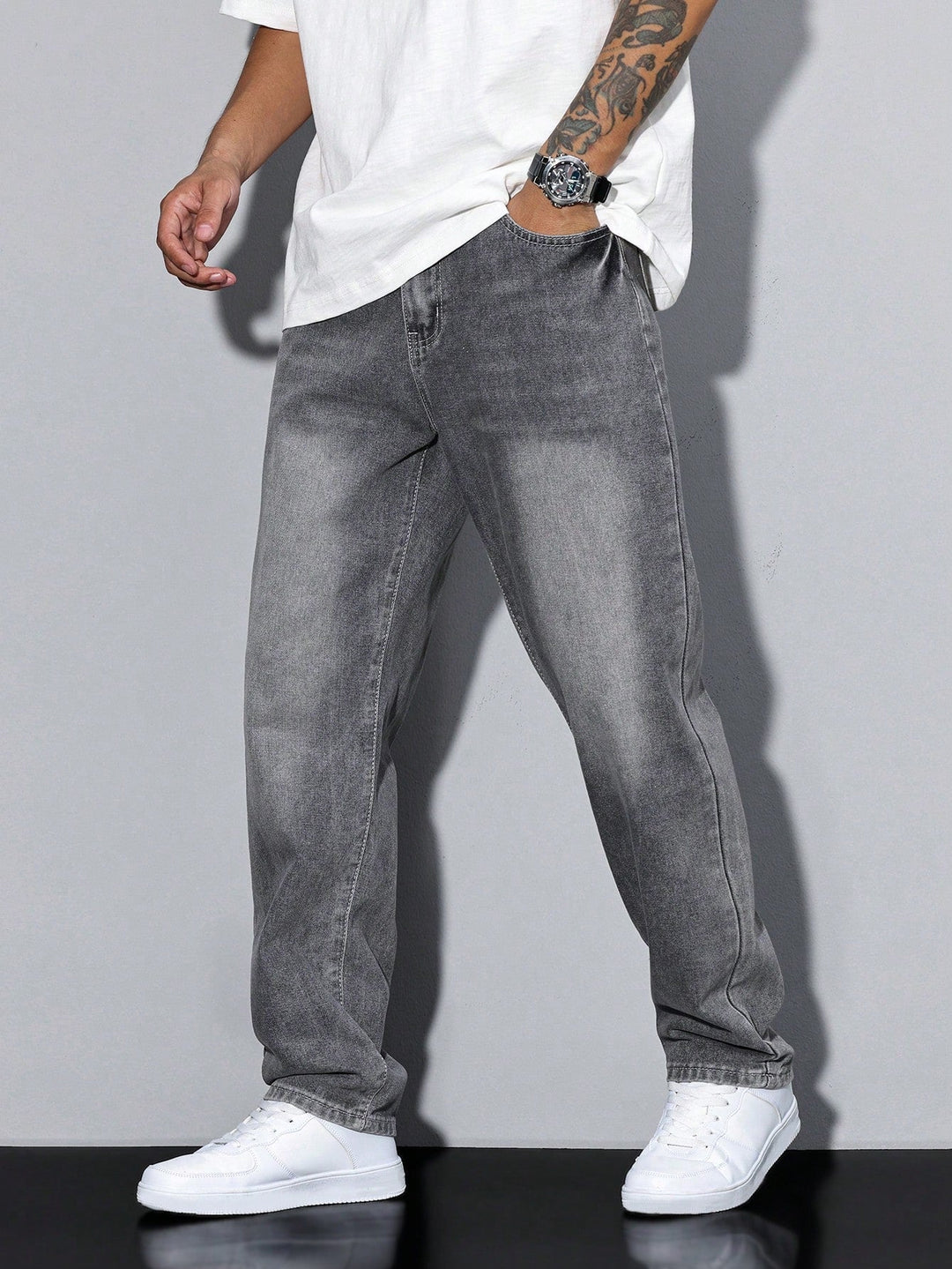 Men's straight fit full-length jeans with a mid-rise waist and front pockets
