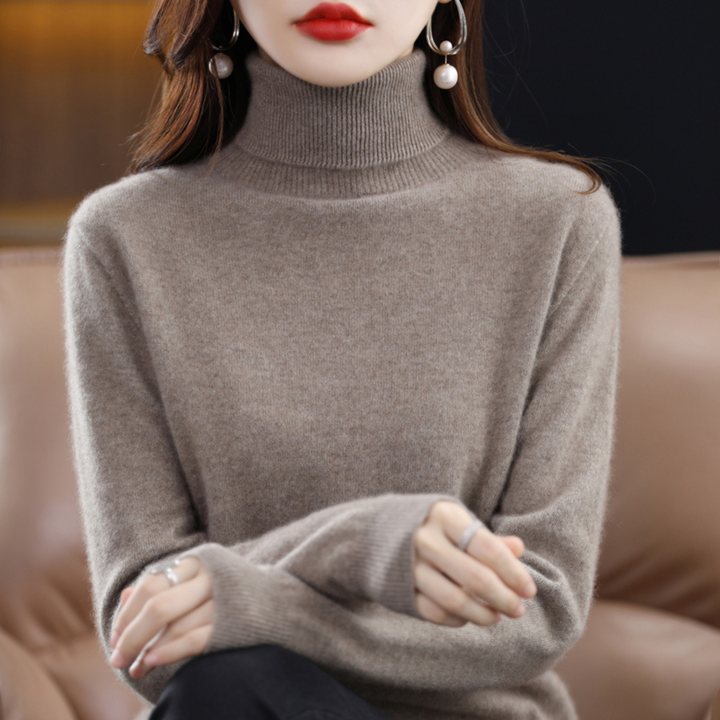 Women's solid knit turtleneck sweater with long sleeves