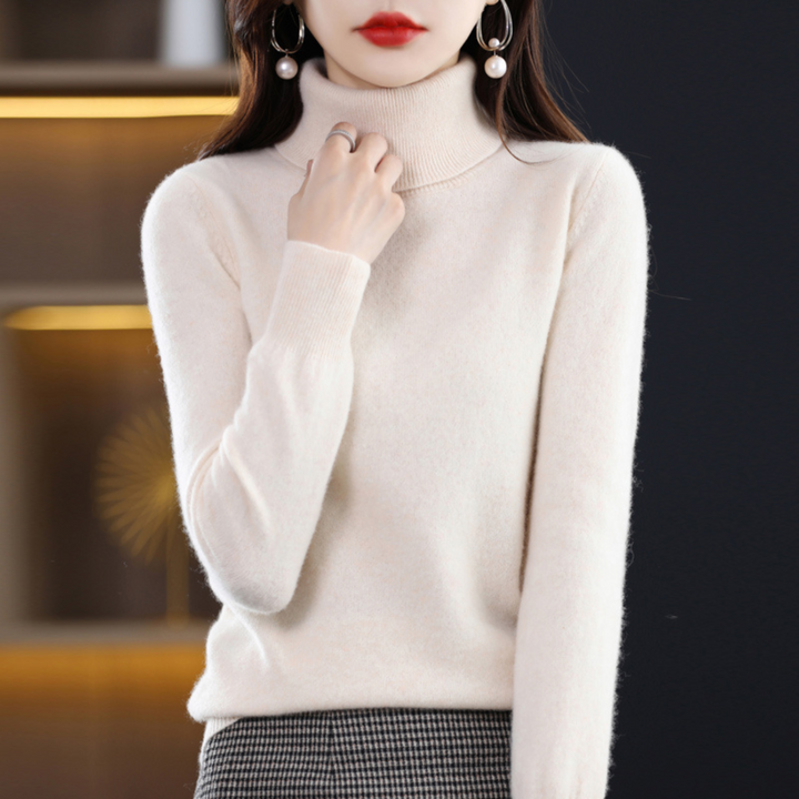 Women's solid knit turtleneck sweater with long sleeves