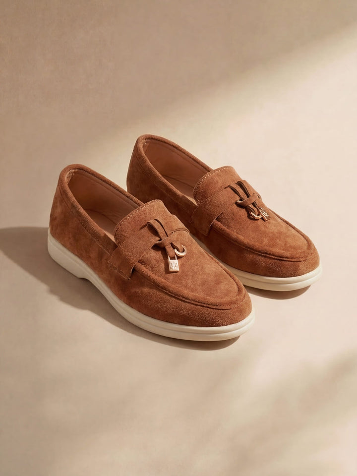 Women's pointed toe loafers with tassel detail