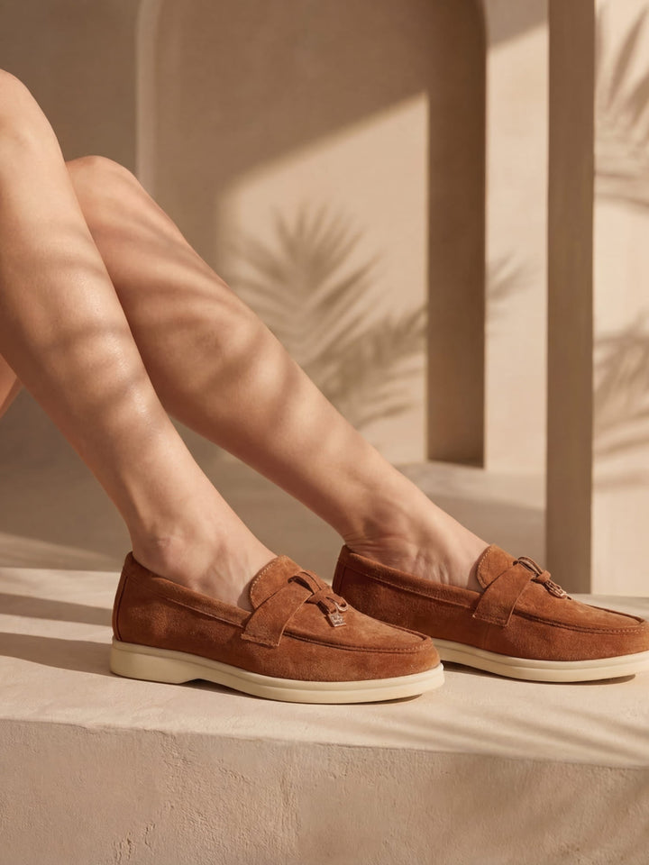 Women's pointed toe loafers with tassel detail