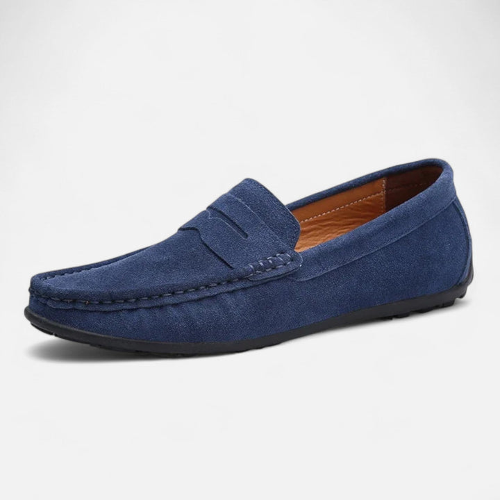 Men's slip-on penny loafer with moc toe stitching and flat sole