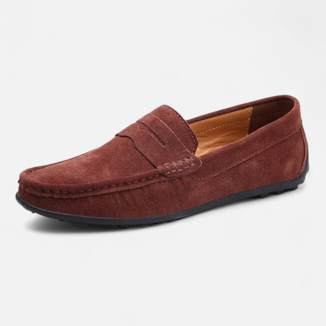 Men's slip-on penny loafer with moc toe stitching and flat sole