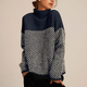 Women's funnel neck sweater with contrasting chevron pattern