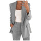 Women's solid blazer and trousers set with notched lapels and flap pockets