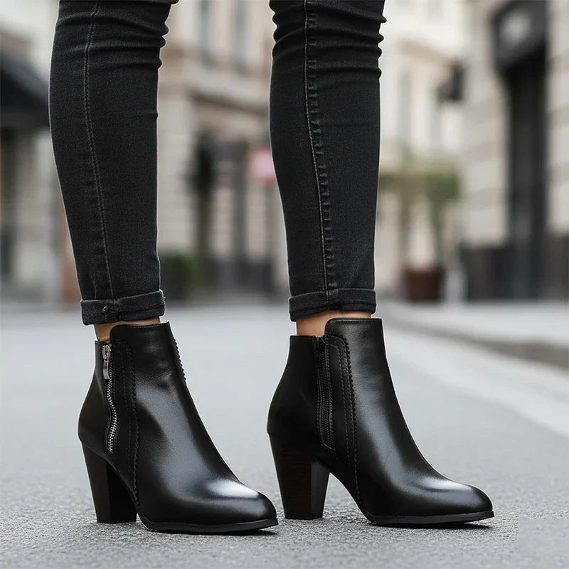 Women's ankle boots with side zippers and high block heels in black and brown
