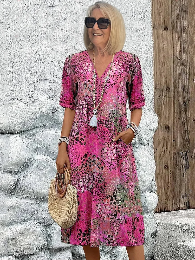 Women's vibrant mosaic pattern midi dress with V-neck and three-quarter sleeves, shown in red and teal