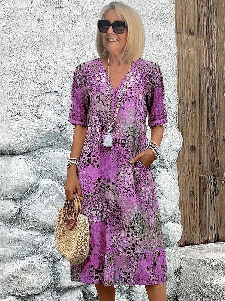 Women's vibrant mosaic pattern midi dress with V-neck and three-quarter sleeves, shown in red and teal