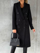 Women's long double-breasted coat with lapels and flap pockets
