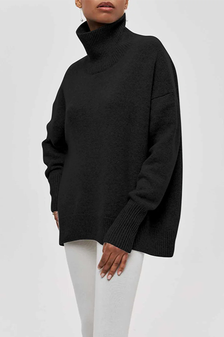 Women's oversized turtleneck sweater with ribbed trims and three-quarter sleeves