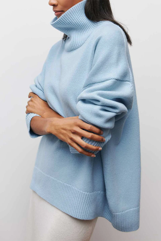 Women's oversized turtleneck sweater with ribbed trims and three-quarter sleeves