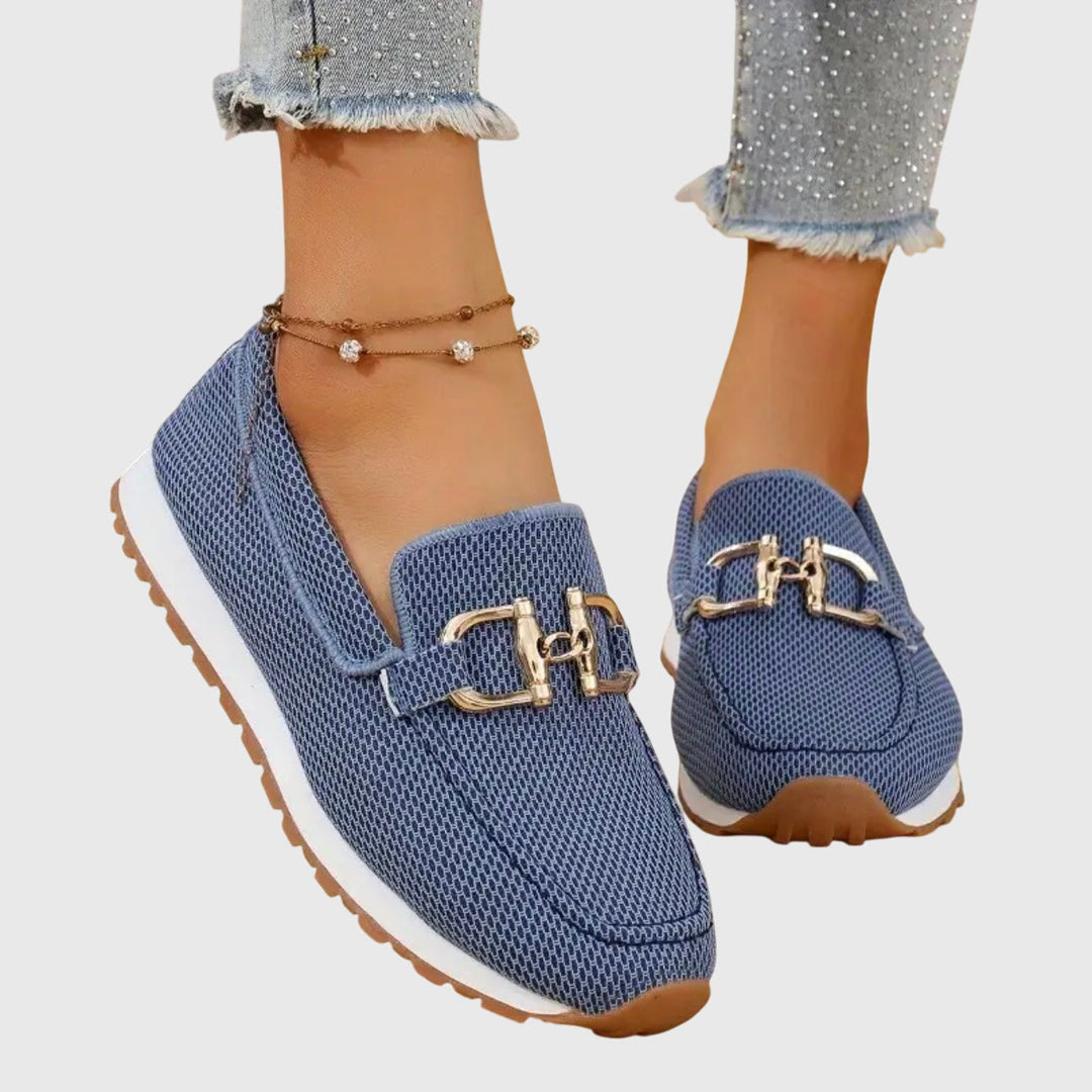 Women's loafer sneakers with metal bar detail and flat textured sole