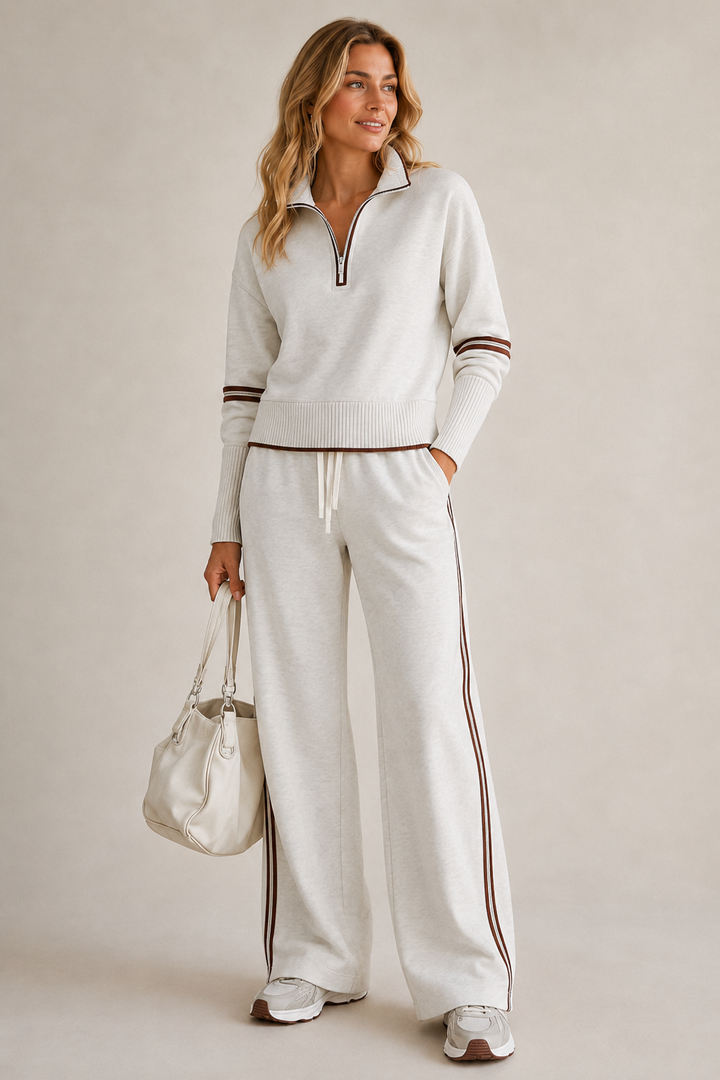 Women's zip sweater and wide-leg trouser set with contrast stripes