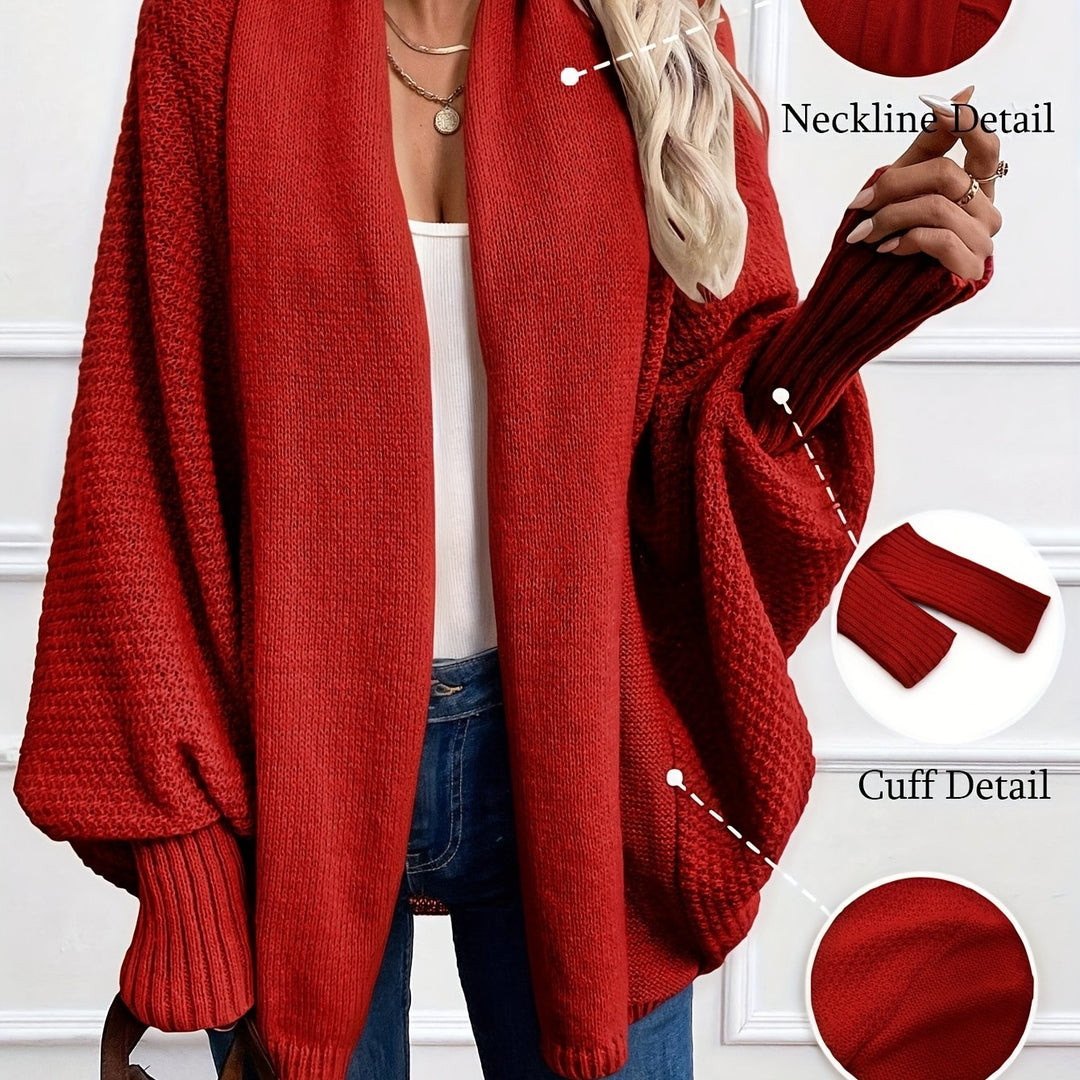 Women's draped open-front cardigan with shawl collar and ribbed cuffs