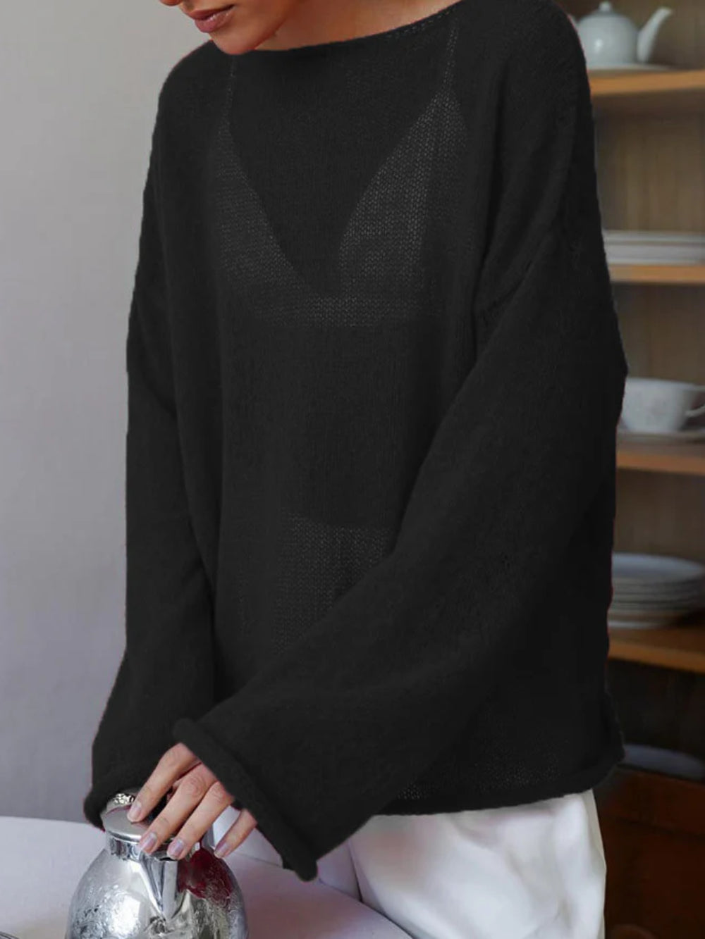 Women's oversized knit pullover with wide sleeves