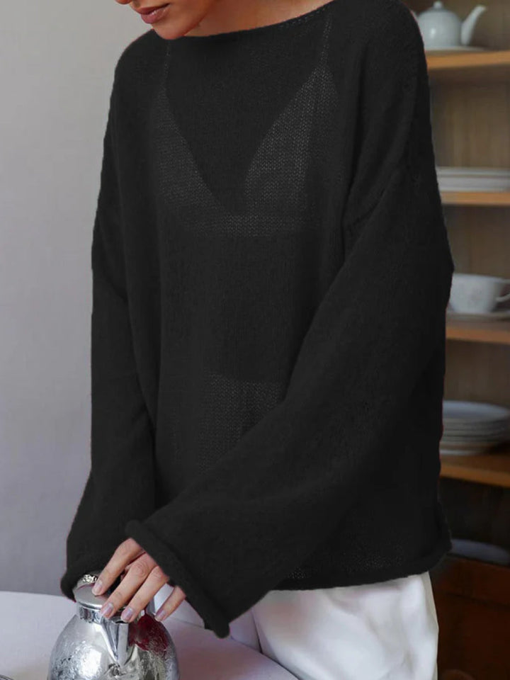 Women's oversized knit pullover with wide sleeves