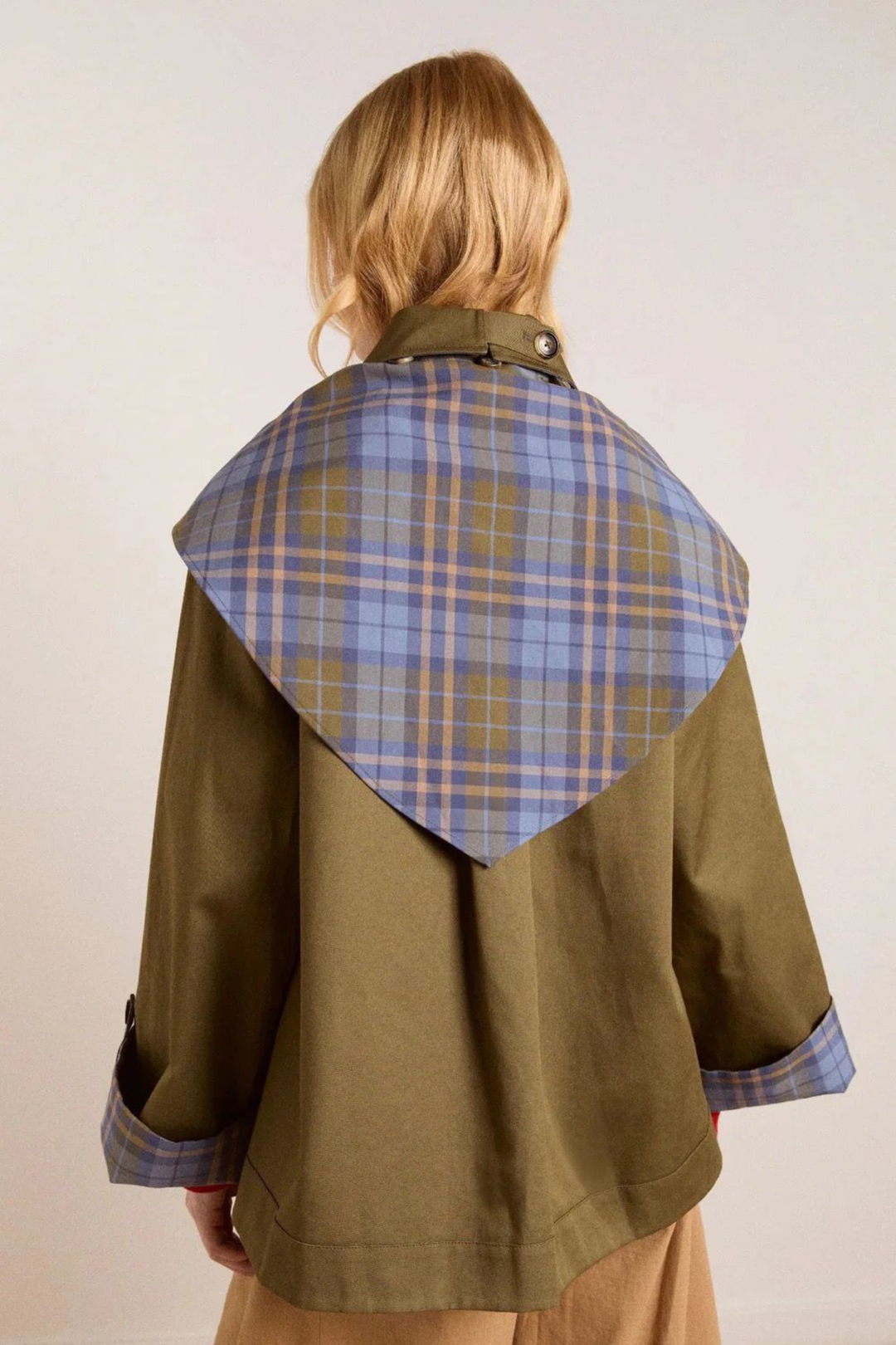 Women's olive utility jacket with blue plaid panels and long sleeves