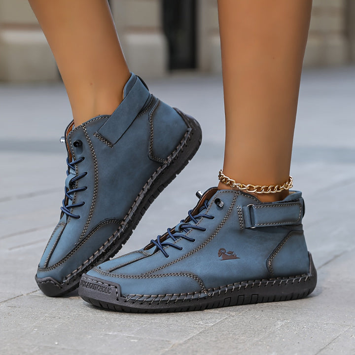 Ankle boots with lace-up fronts, buckle straps and moc toes