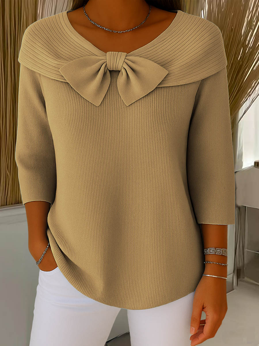 Women's ribbed sweater with round neck, 3/4 sleeves and centre bow detail