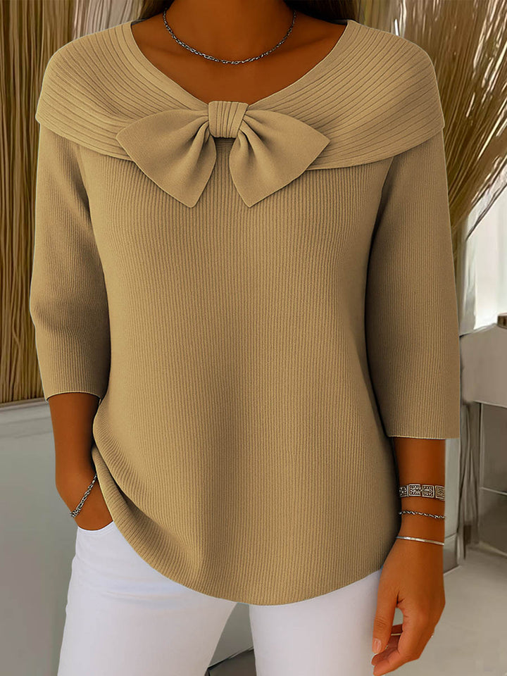 Women's ribbed sweater with round neck, 3/4 sleeves and centre bow detail