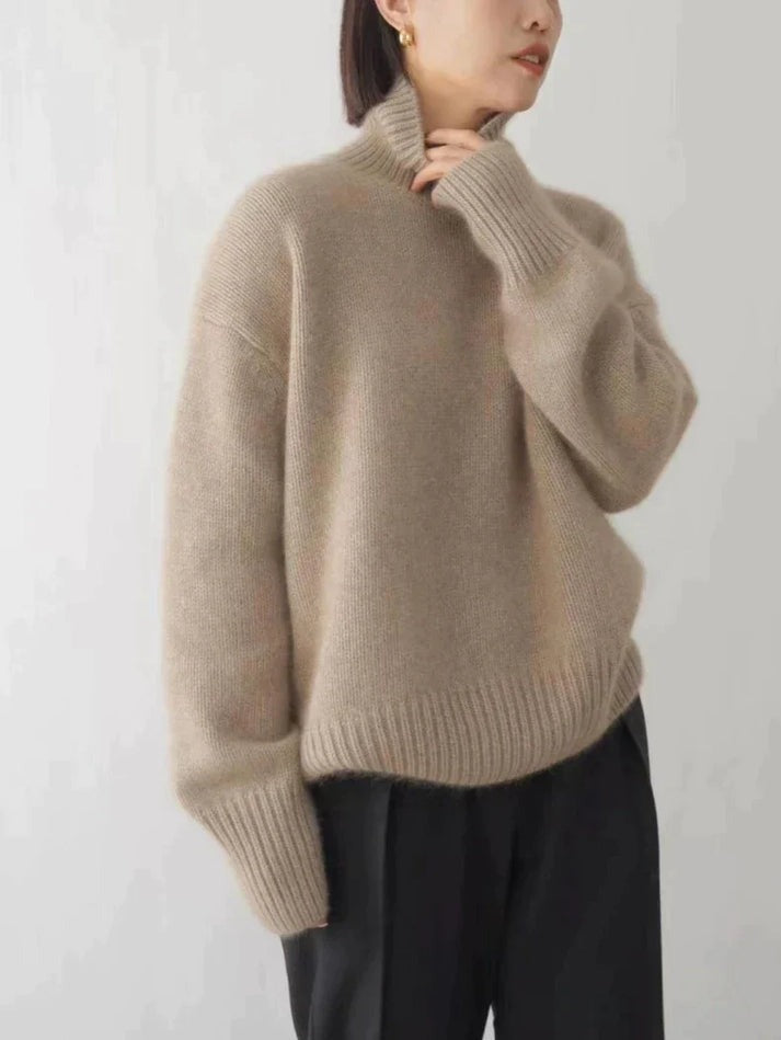 Women's relaxed turtleneck sweater with long sleeves and ribbed trims