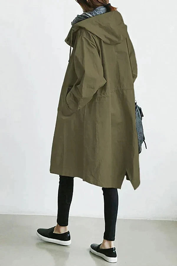 Women's oversized hooded mid-length trench coat with button front and side pockets