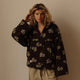 Women's floral fleece sweatshirt with hood, half-zip front and large kangaroo pocket