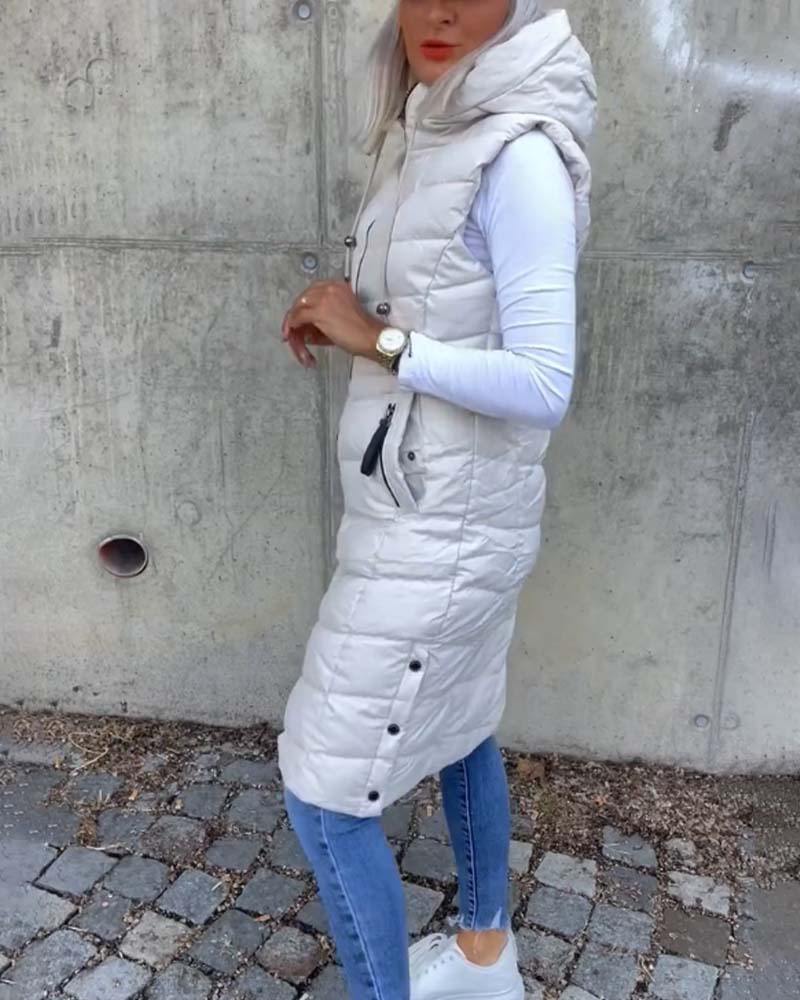 Women's white sleeveless quilted hooded longline vest with front zipper and zip pockets