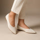 Women's pointed knit flats with a flat sole