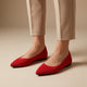 Women's pointed knit flats with a flat sole