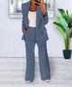 Women's two-piece trouser suit with open blazer and wide-leg pants