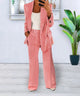 Women's two-piece trouser suit with open blazer and wide-leg pants