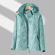 Women's hooded leaf print rain jacket with long sleeves and zipped pockets