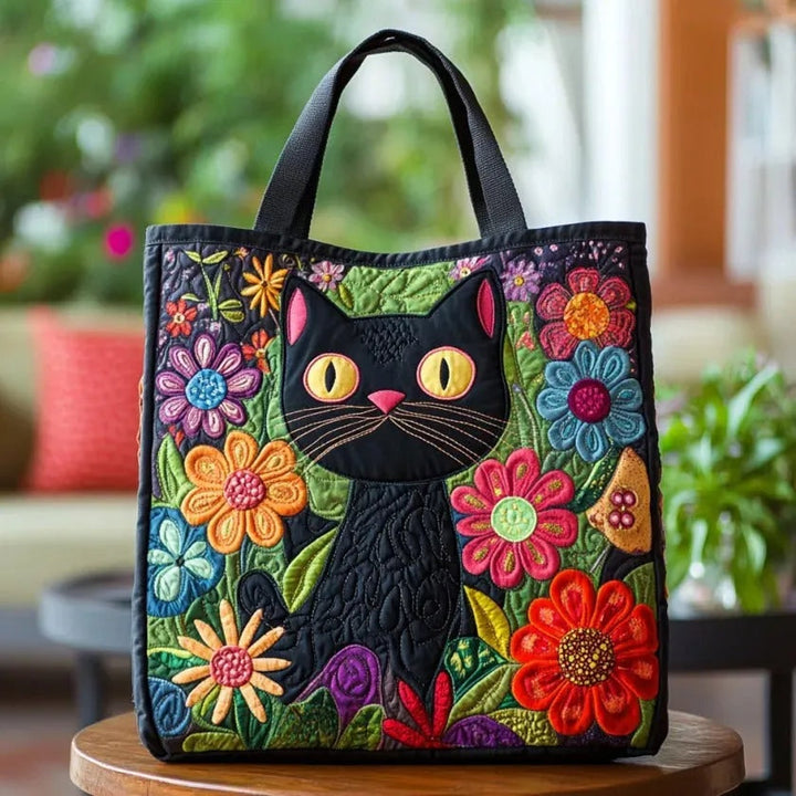 Women's quilted tote bag with colourful floral and graphic print