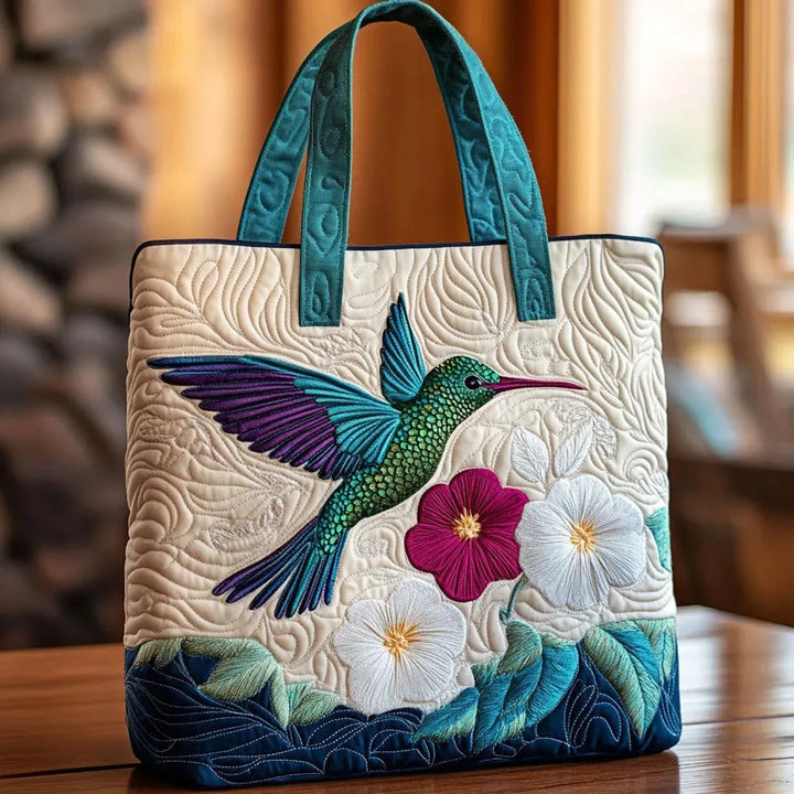 Women's quilted tote bag with colourful floral and graphic print