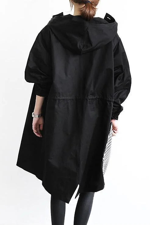 Women's oversized hooded mid-length trench coat with button front and side pockets