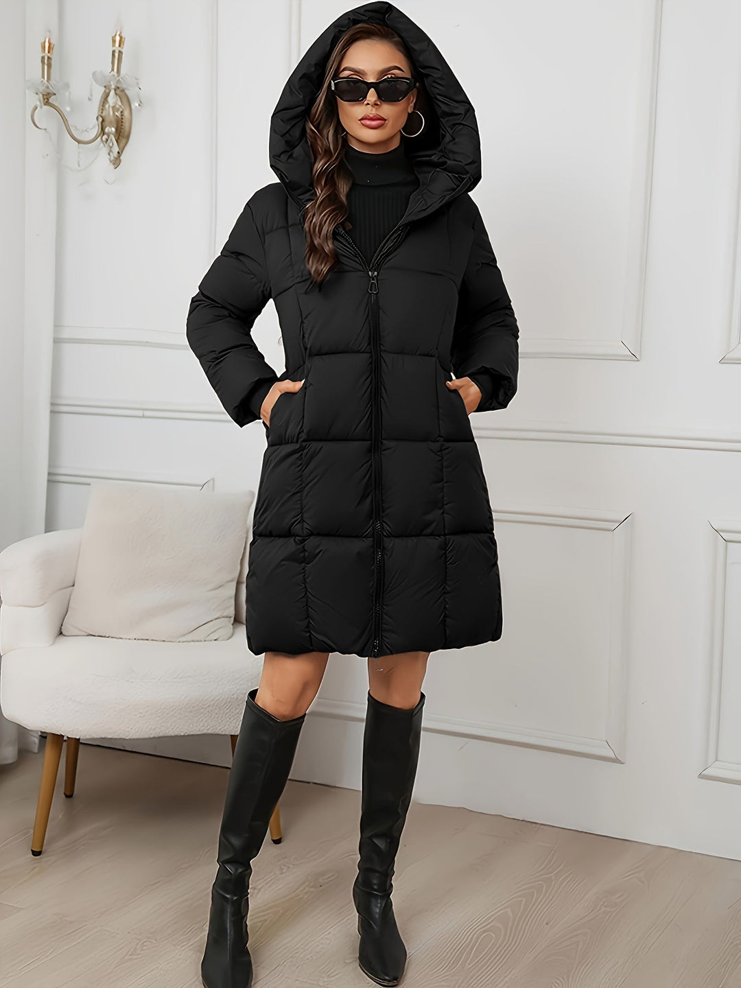Women's long quilted hooded puffer jacket with zip front